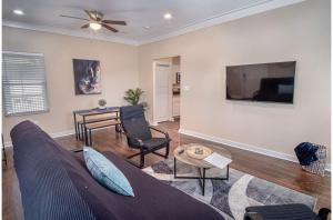 a living room with a couch and a table at Fabulous Newly Renovated 2Br1Ba Near Downtown in San Antonio