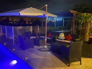 Posedenie v ubytovaní Magnifique Villa avec piscine Beaujolais