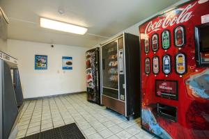 a room with a cocacola machine in a store at Motel 6-Elkton, MD in Elkton