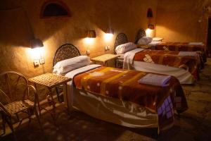 Ένα ή περισσότερα κρεβάτια σε δωμάτιο στο Riad Du Sud