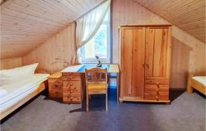 Postel nebo postele na pokoji v ubytování Nice Home In Rechlin With Sauna