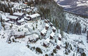 an aerial view of a house covered in snow at Alpinhytte 2 in Favang