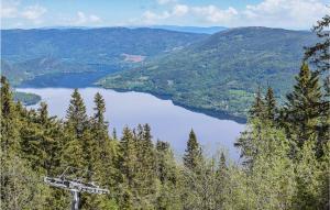a view of a lake from the top of a mountain at Awesome Apartment In Noresund With Wifi in Noresund