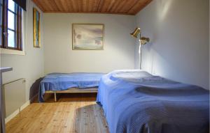 Postel nebo postele na pokoji v ubytování 4 Bedroom Gorgeous Home In Borgholm