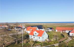 an aerial view of a house with orange roofs at 4 Bedroom Gorgeous Home In Degerhamn in Degerhamn