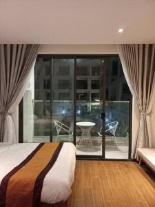 Ein Bett oder Betten in einem Zimmer der Unterkunft Apec 5 sao TP.Tuy Hòa - View biển và view hồ bơi
