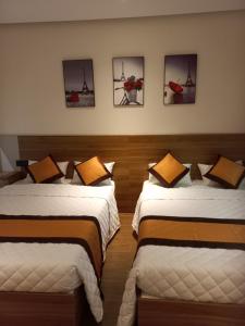 Ein Bett oder Betten in einem Zimmer der Unterkunft Apec 5 sao TP.Tuy Hòa - View biển và view hồ bơi