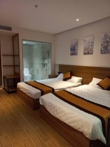 Posteľ alebo postele v izbe v ubytovaní Apec 5 sao TP.Tuy Hòa - View biển và view hồ bơi