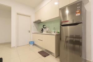 Kuchyň nebo kuchyňský kout v ubytování Teega Suites by RR JBcity