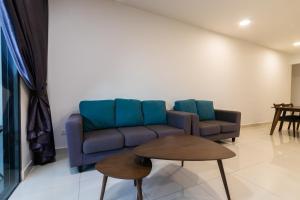 Posezení v ubytování Teega Suites by RR JBcity