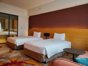 Postel nebo postele na pokoji v ubytování Parkview Hotels & Resorts