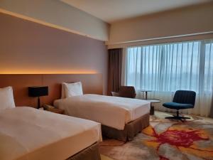 Postel nebo postele na pokoji v ubytování Parkview Hotels & Resorts