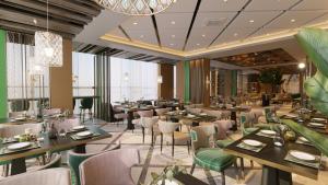 a rendering of a restaurant with tables and chairs at MIllennium Plaza Hotel & Mall Ulaanbaatar in Ulaanbaatar