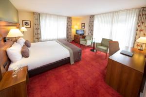 Postel nebo postele na pokoji v ubytování Hotel De Bilderberg