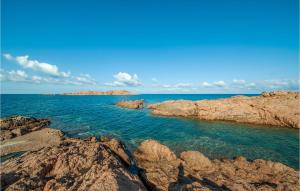a view of the ocean from the rocks at Bilo Sup in Isola Rossa