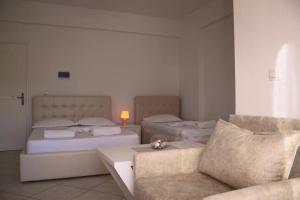 Postel nebo postele na pokoji v ubytování Orea Hotel