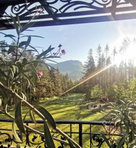 a view from the balcony of a house in the mountains at Вила АРБОРЕТУМ in Teteven