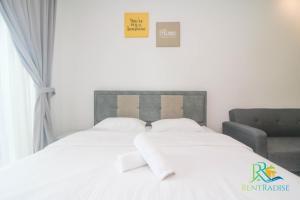 Postel nebo postele na pokoji v ubytování Teega Suites by RR JBcity