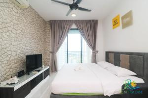 Postel nebo postele na pokoji v ubytování Teega Suites by RR JBcity