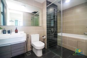 Koupelna v ubytování Teega Suites by RR JBcity