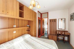 Postel nebo postele na pokoji v ubytování Albergo Belvedere