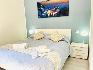 Postel nebo postele na pokoji v ubytování Appunti Di Viaggio Guesthouse + 9 fotografií