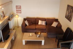 Un lugar para sentarse en Vakantiehuis De Lounge