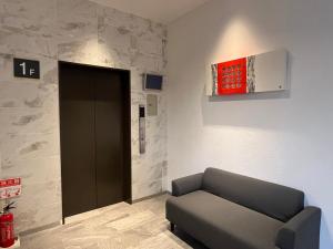 Plaza In Kanku Hotel的休息区