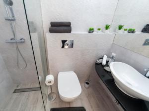 Um banheiro em Villa Mona 2