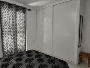 Łóżko lub łóżka w pokoju w obiekcie Vera Natura Apartamento Tony