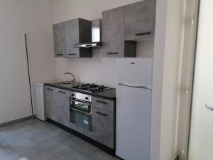 Kuchyňa alebo kuchynka v ubytovaní Appartamento Furetto Lido Marini