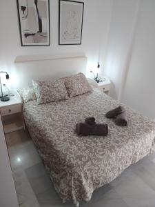 Postel nebo postele na pokoji v ubytování Apartamento cerca del centro histórico de Málaga II