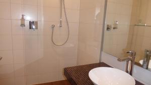 Ein Badezimmer in der Unterkunft Boardinghouse am Wall