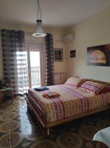 Postel nebo postele na pokoji v ubytování Camera a Palermo