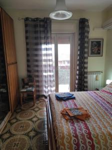 Postel nebo postele na pokoji v ubytování Camera a Palermo