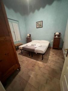 Een bed of bedden in een kamer bij Agriturismo Baratti