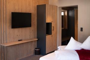 TV o dispositivi per l'intrattenimento presso Hotel Post