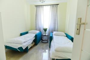 Posteľ alebo postele v izbe v ubytovaní M&K Apartamenty Rodzinny, Gdańsk - Wyspa Sobieszewska