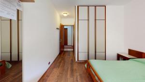 Postel nebo postele na pokoji v ubytování Hotel Davost
