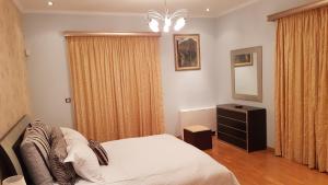Posteľ alebo postele v izbe v ubytovaní Villa Omega Kefalonia