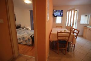 TV a/nebo společenská místnost v ubytování Apartment Marko