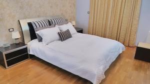 Posteľ alebo postele v izbe v ubytovaní Villa Omega Kefalonia + 21 fotografií