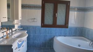 Kúpeľňa v ubytovaní Villa Omega Kefalonia