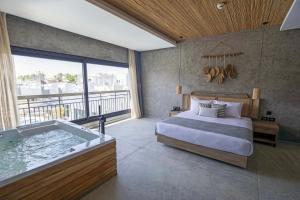 Sunrise Tucana Resort Grand Select客房内的一张或多张床位