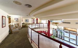 a room with a staircase and a living room at Perla Marina in Nerja