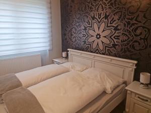 Posteľ alebo postele v izbe v ubytovaní Hürrem Apartman