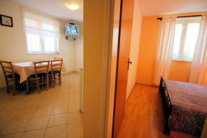 Postel nebo postele na pokoji v ubytování Apartment Marko