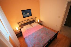 Postel nebo postele na pokoji v ubytování Apartment Marko