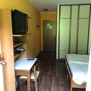 Postel nebo postele na pokoji v ubytování Hotel Davost