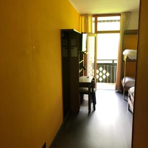 Postel nebo postele na pokoji v ubytování Hotel Davost